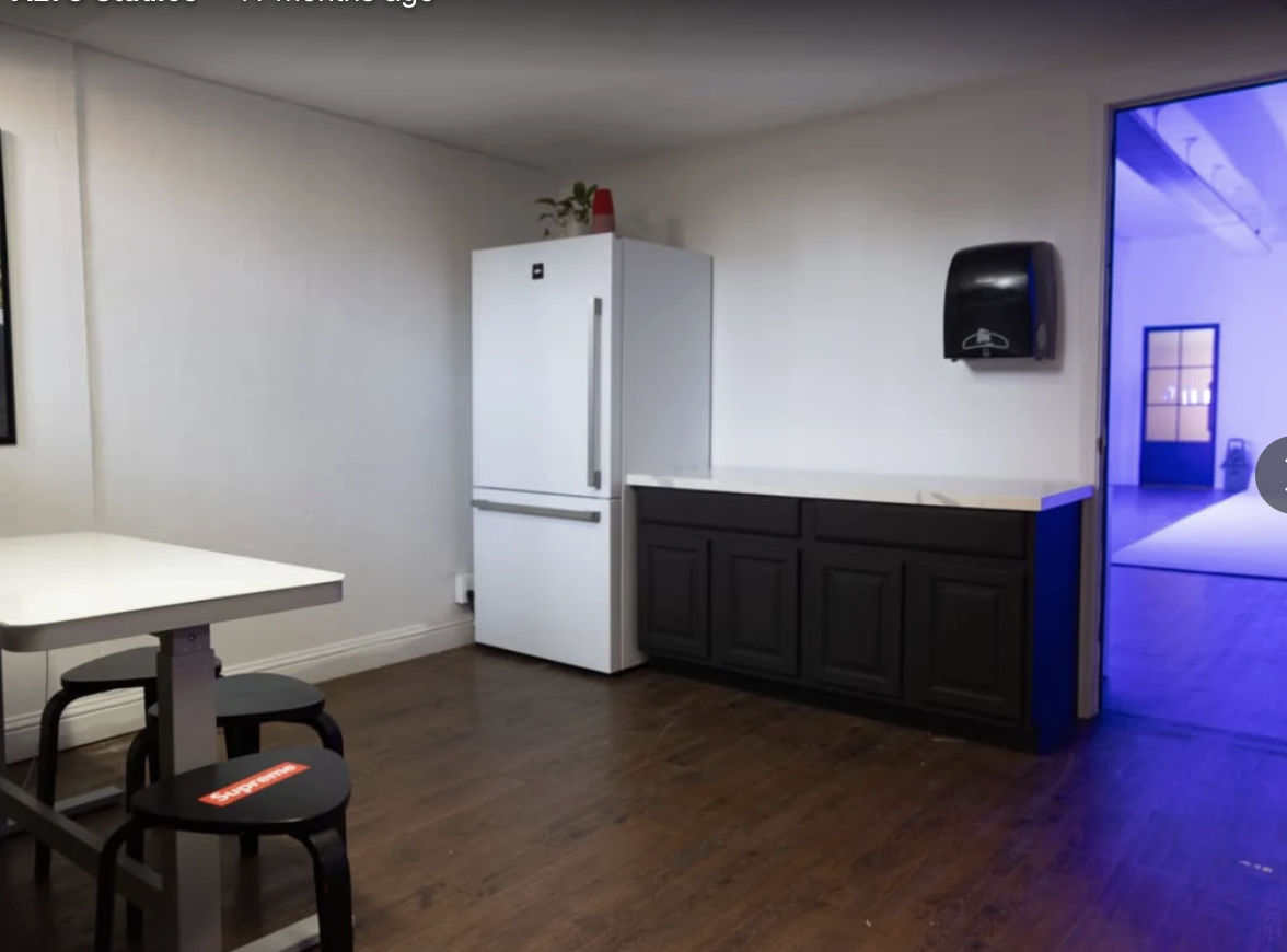 Green room and lounge area with kitchenette
